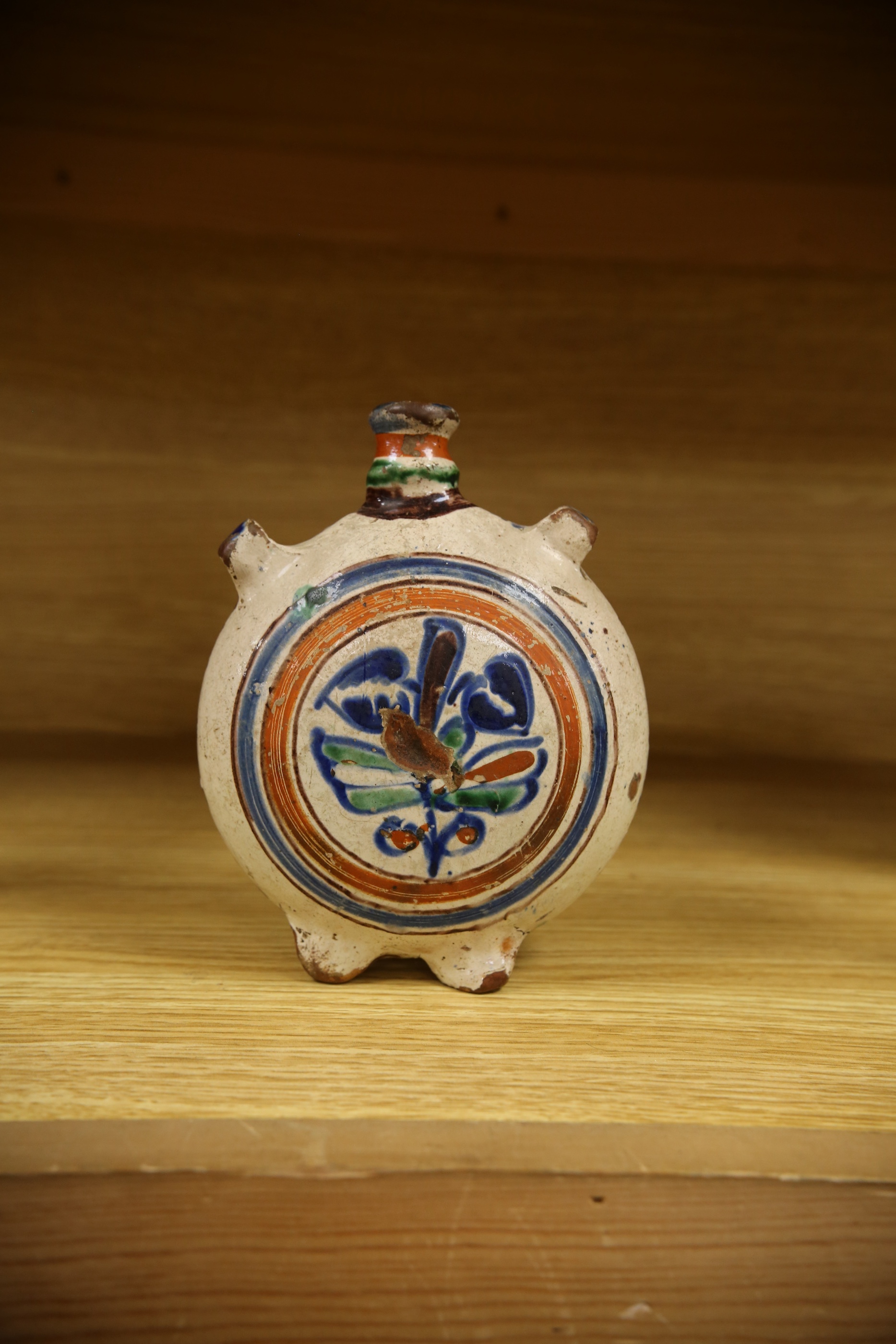 An 18th century? Spanish maiolica pilgrim flask, 17cm. Condition - poor to fair